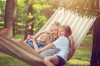 Mother in Hammock with two kids