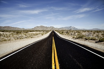 Picture of highway going through the desert