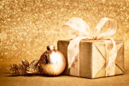 Image of gold christmas present with gold ornament